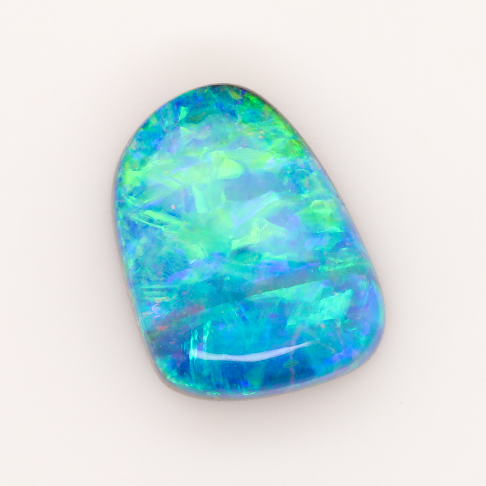 blue, green, yellow unset solid boulder opal