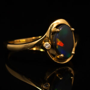 Yellow Gold Blue Green Yellow Orange Australian Solid Black Opal and Diamond Ring