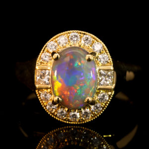 Yellow Gold Blue Green Yellow Orange Red Semi Black Opal and Diamond Ring