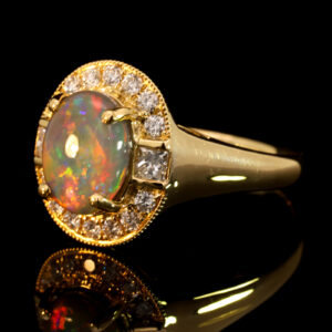 Yellow Gold Blue Green Yellow Orange Red Semi Black Opal and Diamond Ring