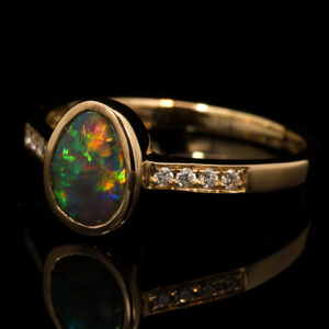 Yellow Gold Blue Green Yellow Orange Semi Black Opal and Diamond Ring