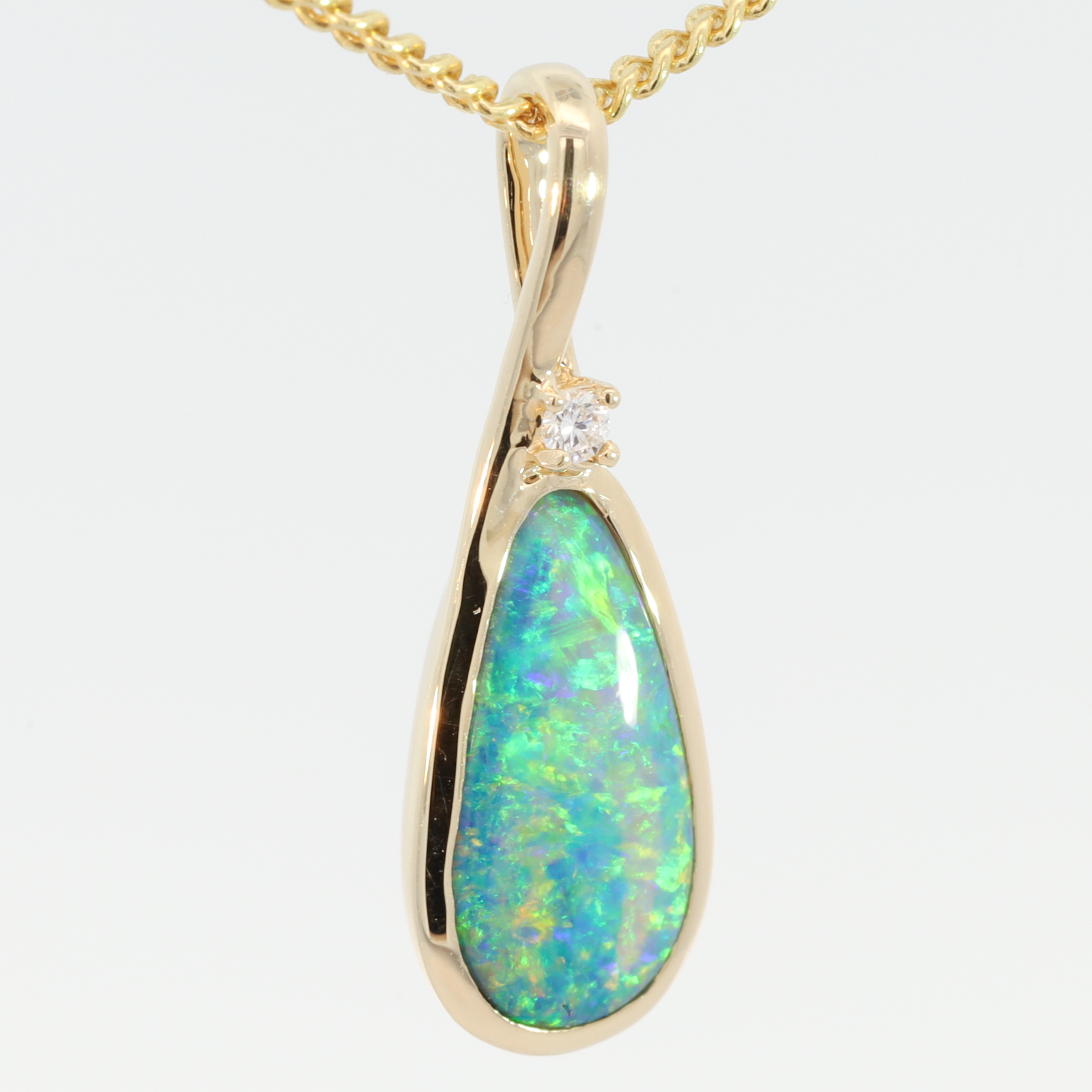 Yellow Gold Blue Green Yellow Orange Black Opal and Diamond Pendant