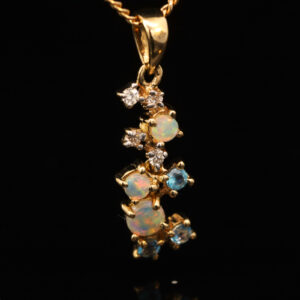 Yellow Gold Blue Green Yellow Orange Pink Crystal Opal Blue Topaz and Diamond Pendant
