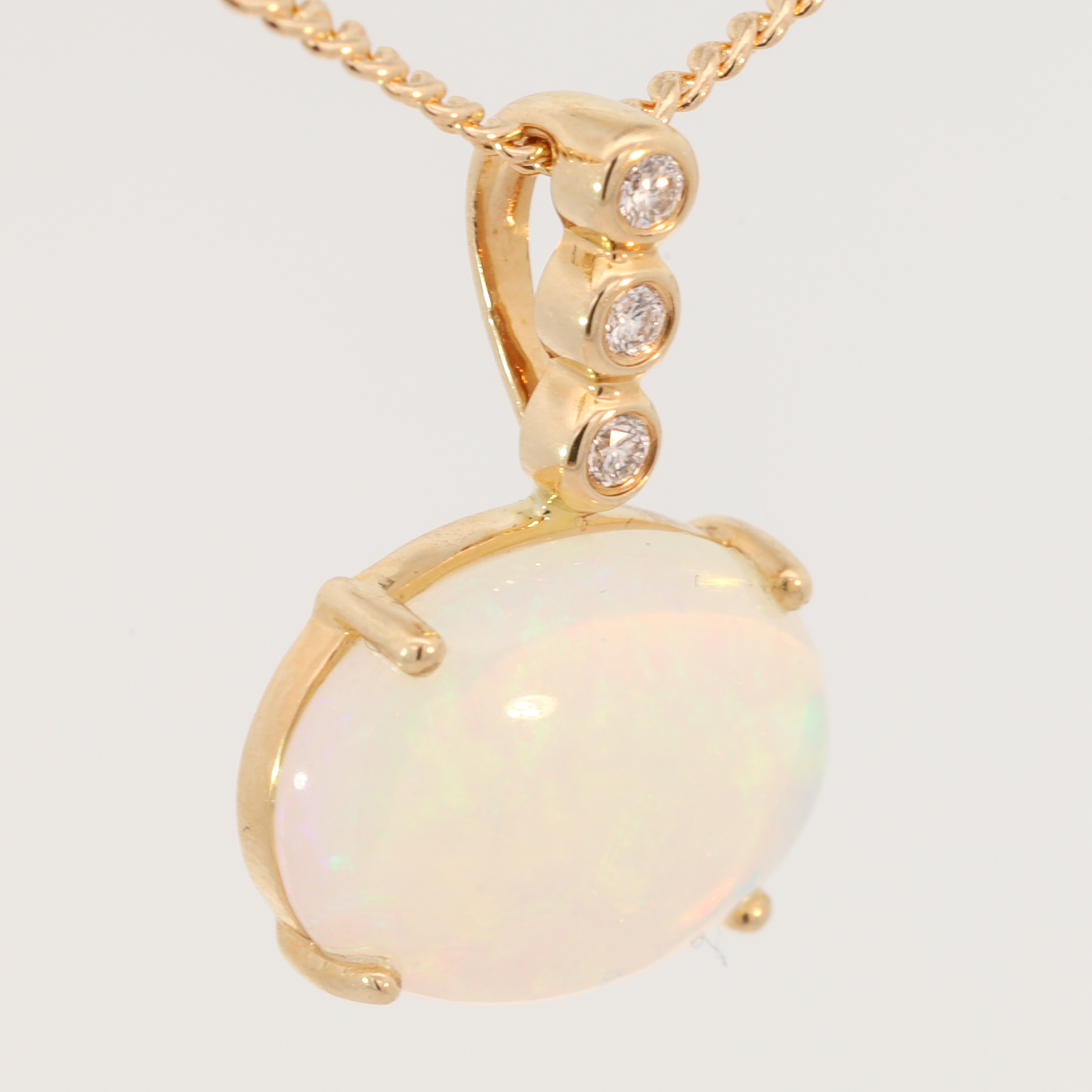 Yellow Gold Blue Green Yellow Orange Crystal Opal and Diamond Pendant
