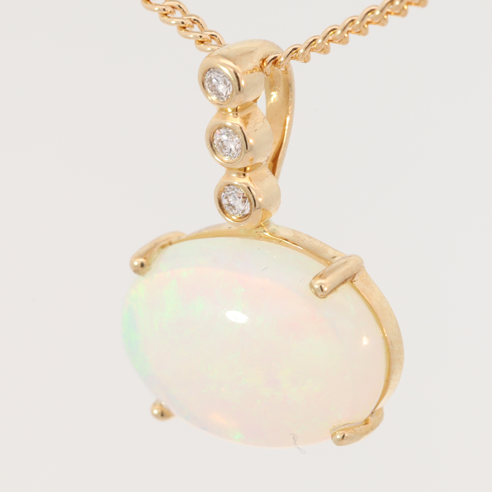 Yellow Gold Blue Green Yellow Orange Crystal Opal and Diamond Pendant
