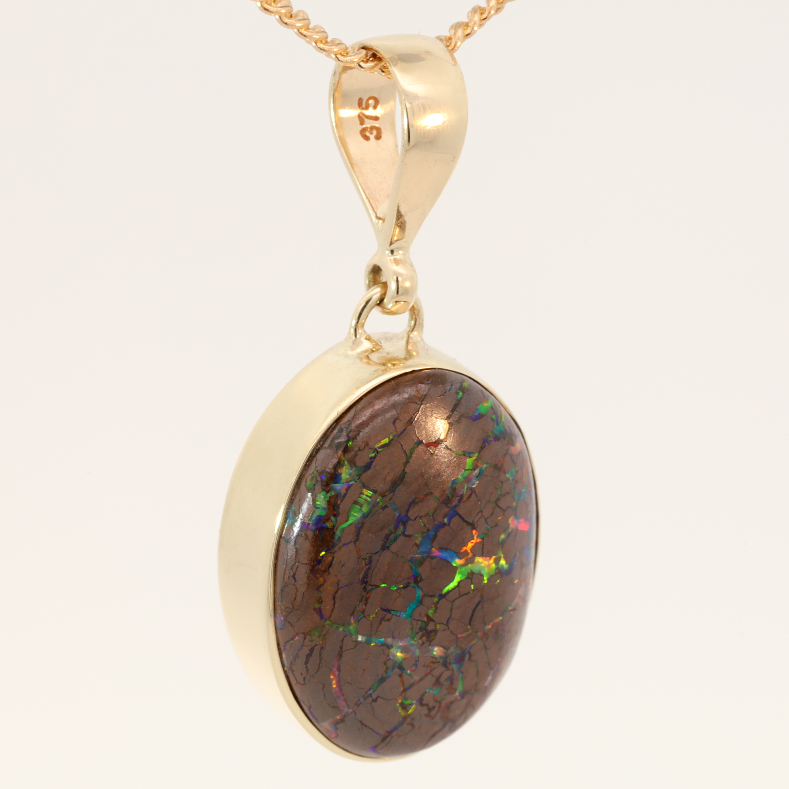 Yellow Gold Blue Green Yellow Orange Red Boulder Opal Pendant