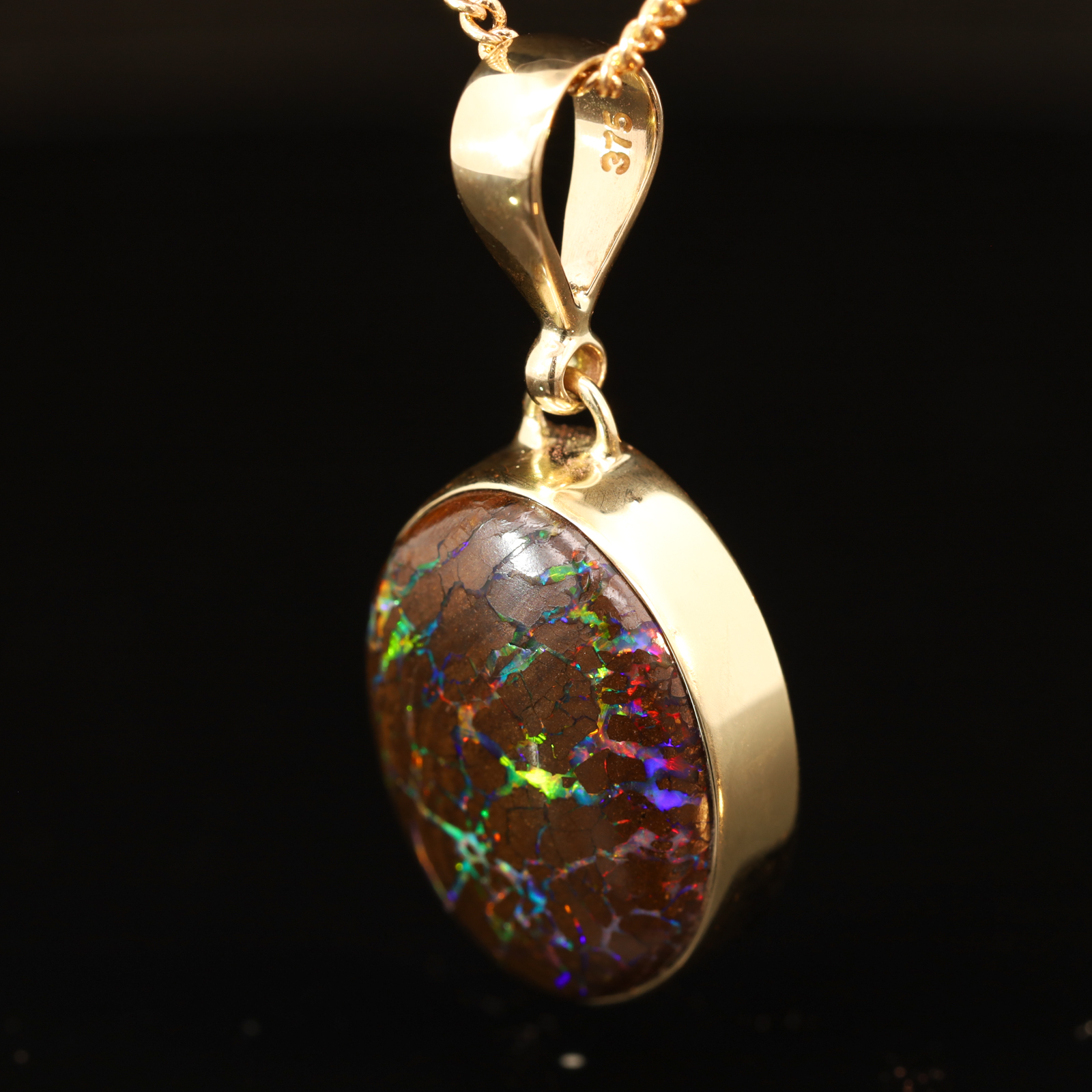Yellow Gold Blue Green Yellow Orange Red Boulder Opal Pendant