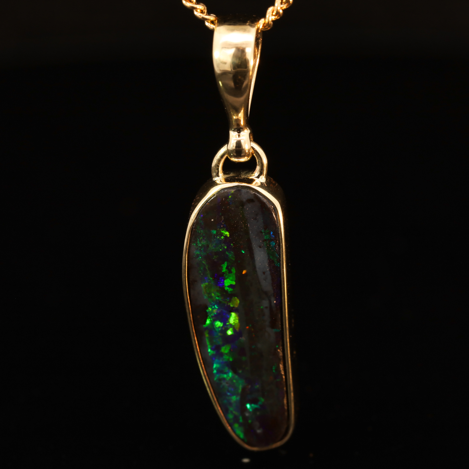Yellow Gold Blue Green Yellow Orange Red Boulder Opal Pendant