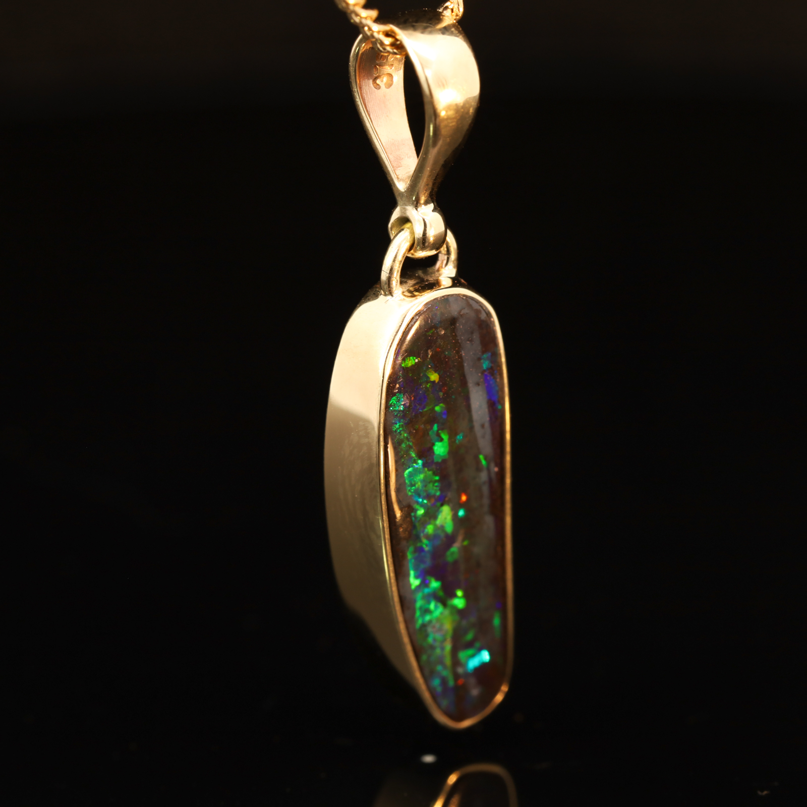 Yellow Gold Blue Green Yellow Orange Red Boulder Opal Pendant