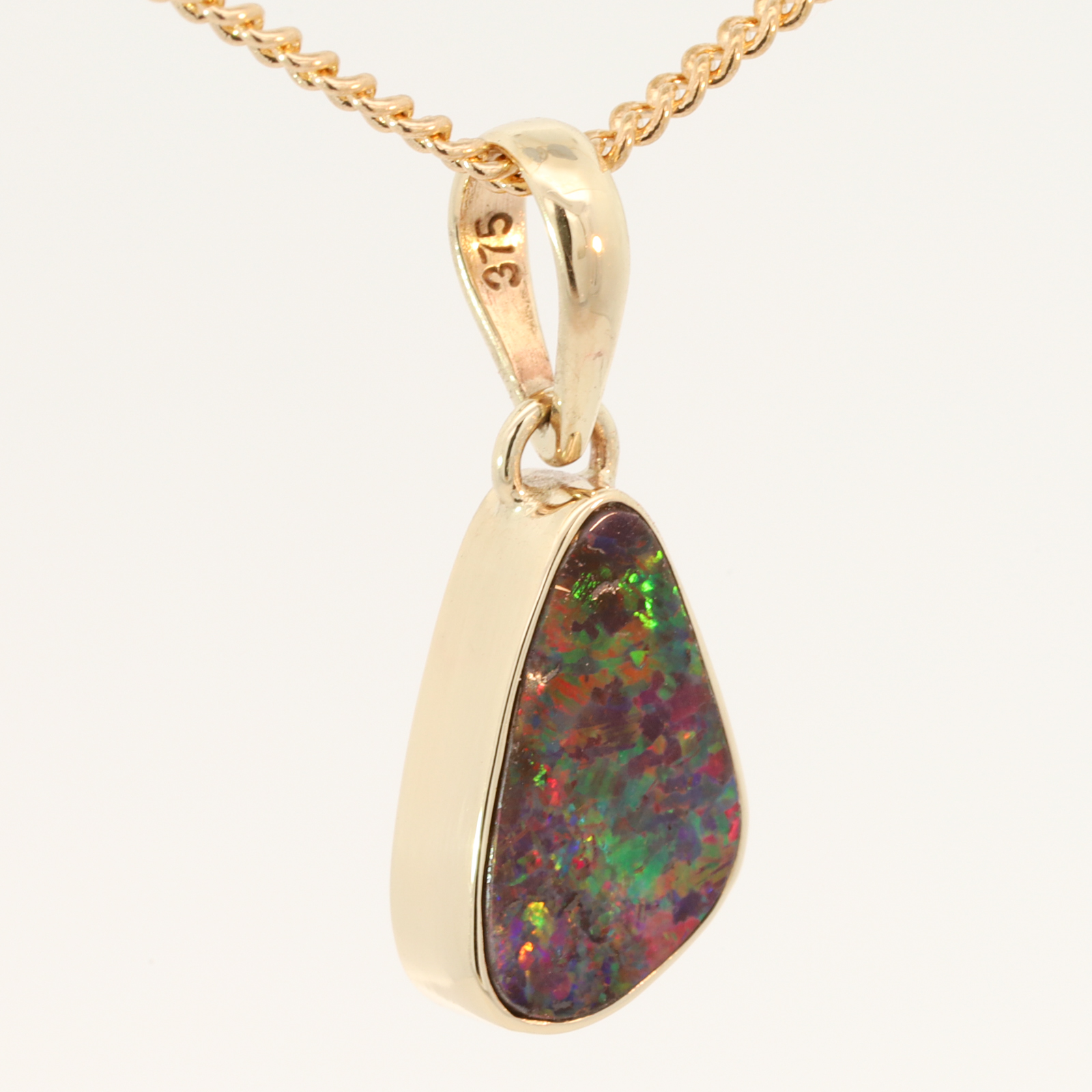 Yellow Gold Blue Green Yellow Orange Red Boulder Opal Pendant