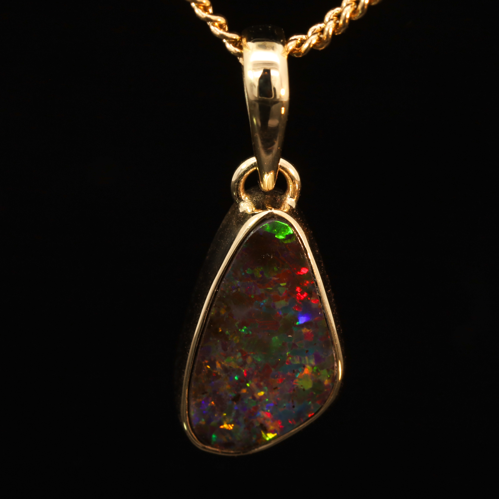 Yellow Gold Blue Green Yellow Orange Red Boulder Opal Pendant