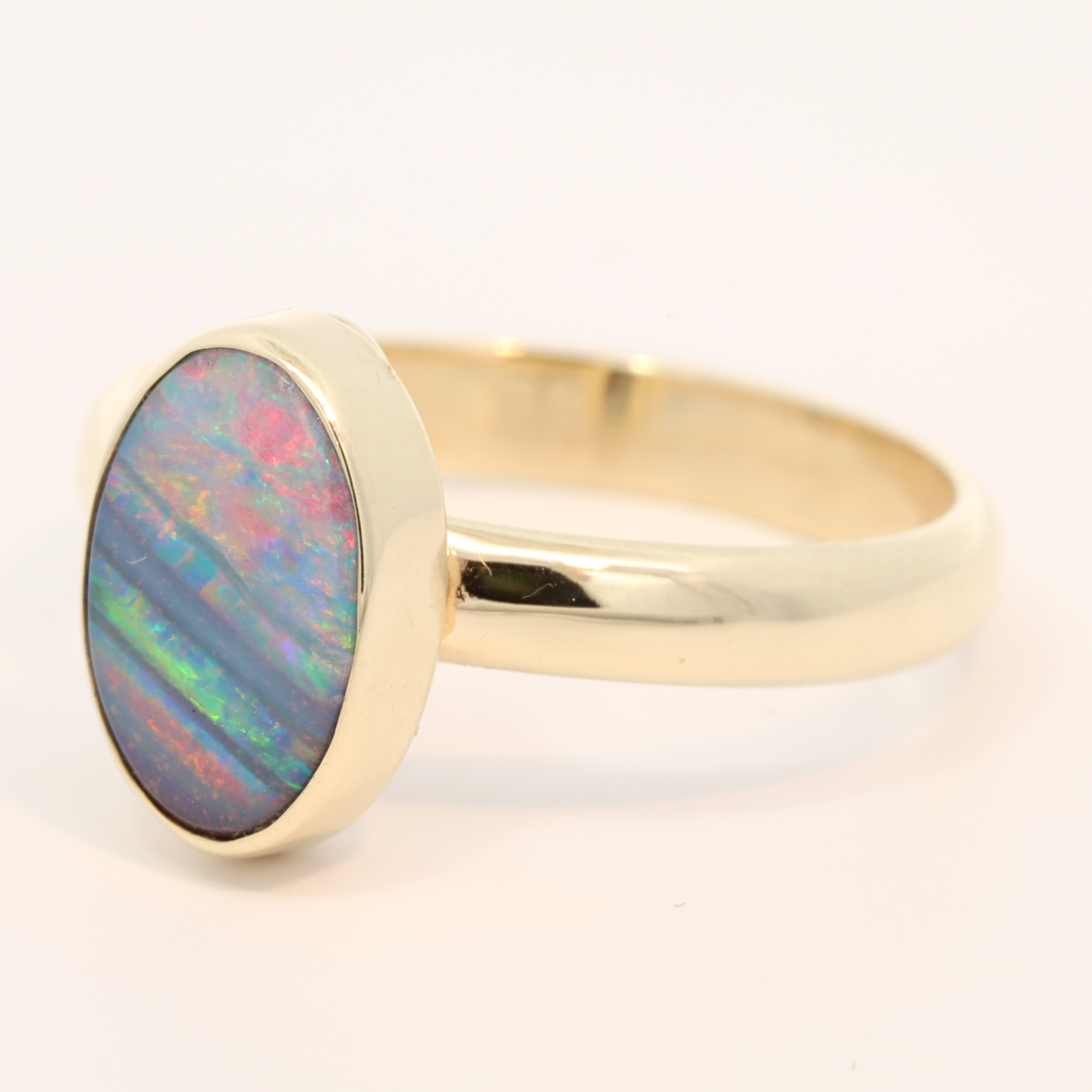 Yellow Gold Blue Green Yellow Orange Red Boulder Opal Ring